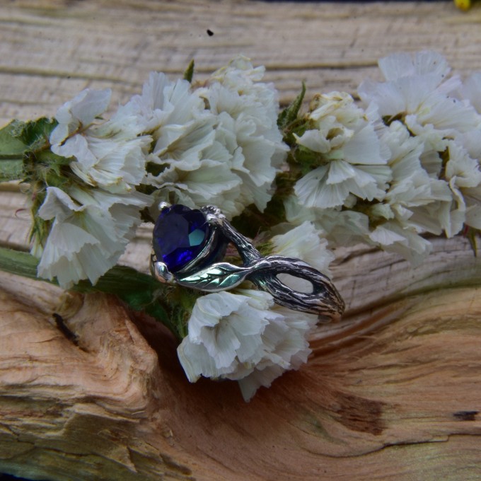 Elegant Gothic Ring with Sapphire and Intricate Design