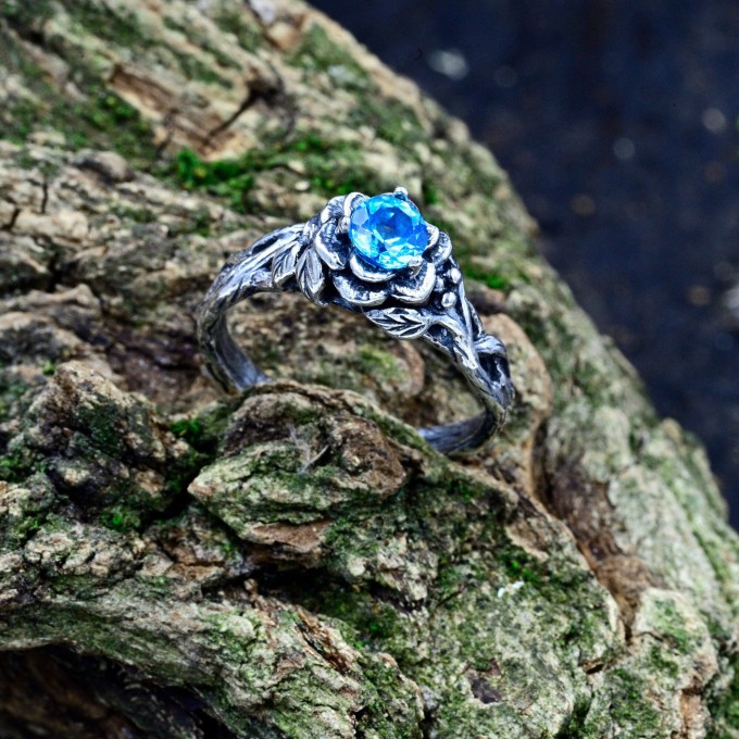 Gothic Aquamarine Ring with Intricate Nature Motif