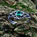 Elegant Silver Ring with Mystical Emerald Gemstone