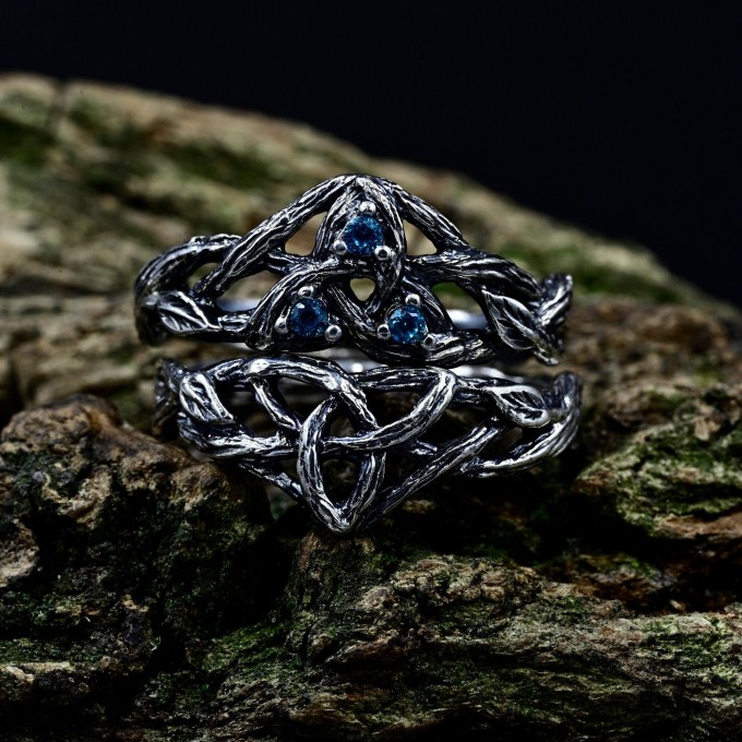 Intricate Gothic Ring with Blue Topaz Accents