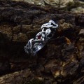 Exquisite Gothic Silver Ring with Garnet and Twisted Design