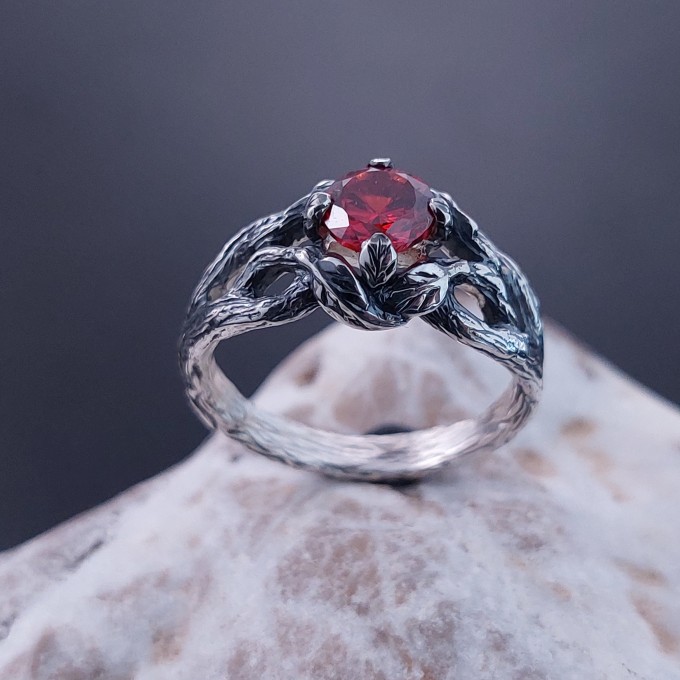 Garnet Bloom: Sterling Silver Ring with a Radiant Scarlet Gem
