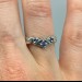 Delicate Silver Ring with Sapphire Petal Design