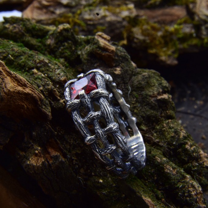 Bold Gothic Ring with Interwoven Chains and Garnet