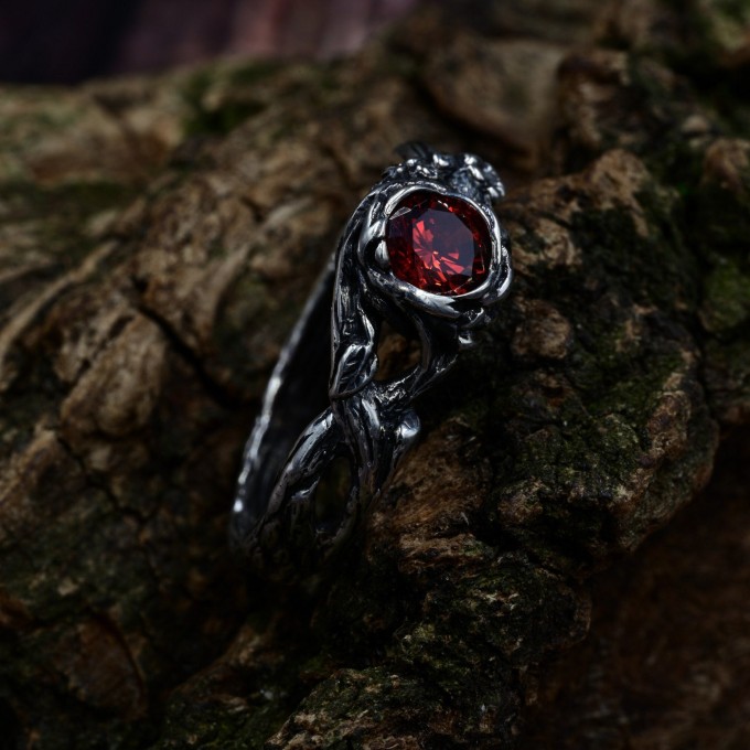 Gothic Silver Ring with Garnet and Intricate Design
