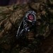 Gothic Silver Ring with Garnet and Intricate Design