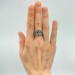 Gothic Blue Topaz Ring with Intricate Celtic Knot Motif