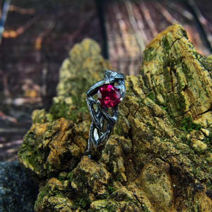 Intricate Silver Ring with Vibrant Ruby Gemstone