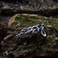 Twisted Vine Ring with a Touch of Emerald Magic