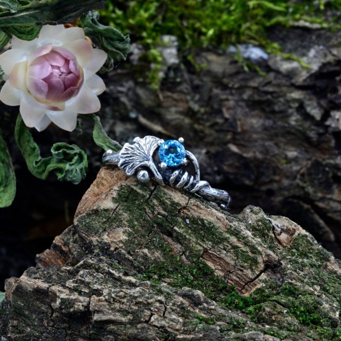 Gothic Silver Ring with a Radiant Blue Topaz