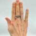 Intricate Gothic Ring with Blue Topaz Accents