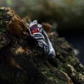Gothic Silver Ring with Garnet and Feather Motif