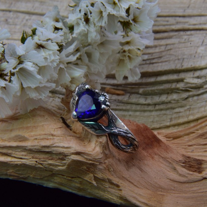 Elegant Gothic Ring with Sapphire and Intricate Design