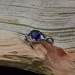 Elegant Gothic Ring with Sapphire and Intricate Design