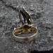 Gothic Emerald Ring with Enchanted Flame Motif