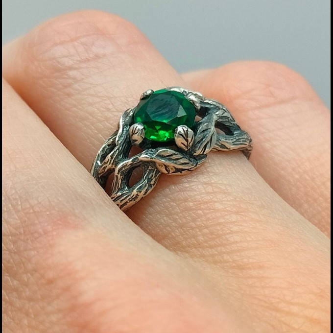 Garnet Bloom: Sterling Silver Ring with a Radiant Scarlet Gem