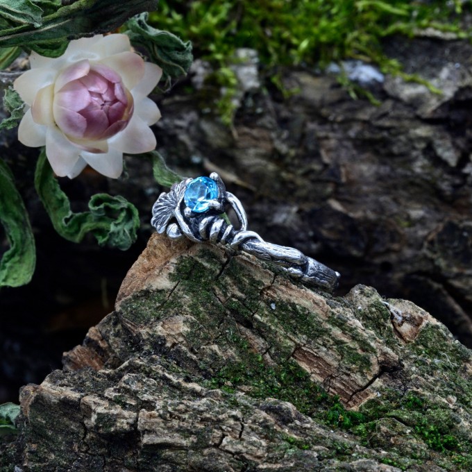 Gothic Silver Ring with a Radiant Blue Topaz