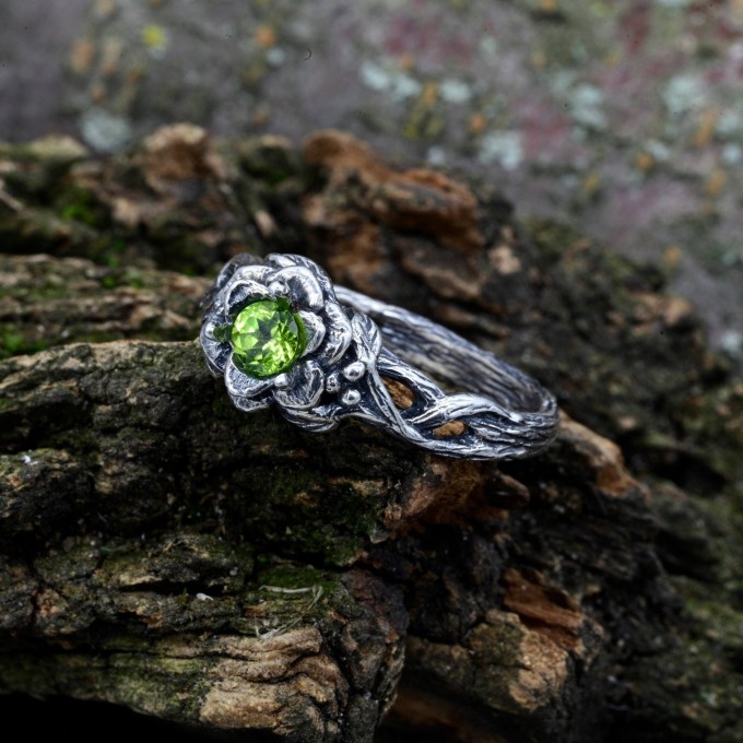 Handcrafted Silver Ring with Emerald and Nature-Inspired Details