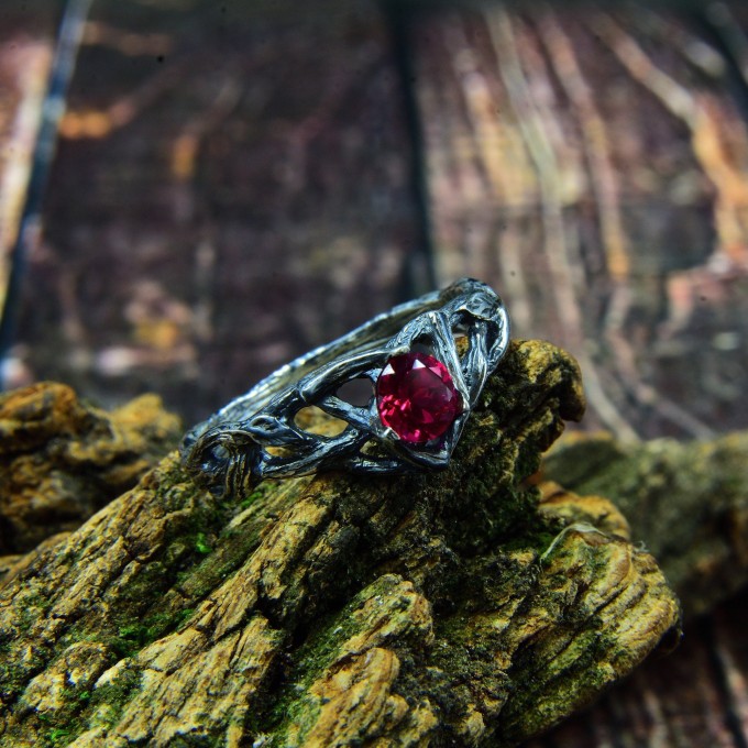Intricate Silver Ring with Vibrant Ruby Gemstone