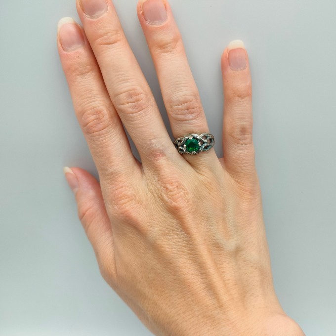 Garnet Bloom: Sterling Silver Ring with a Radiant Scarlet Gem