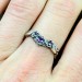 Delicate Silver Ring with Sapphire Petal Design