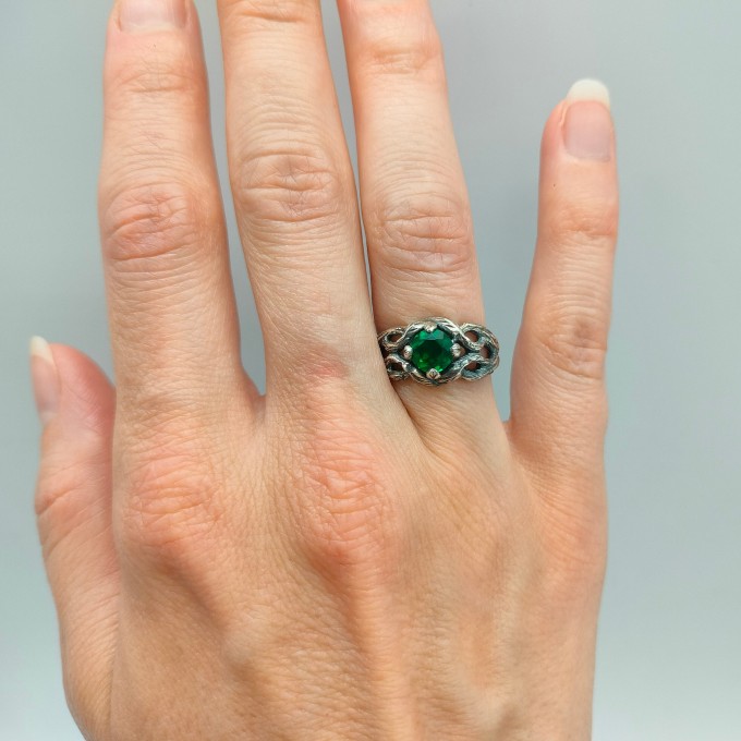 Intricate Silver Ring with Sapphire and Nature Motif