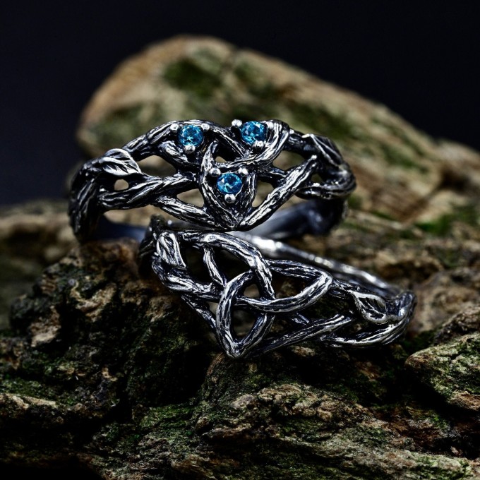 Intricate Gothic Ring with Blue Topaz Accents