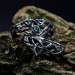 Intricate Gothic Ring with Blue Topaz Accents