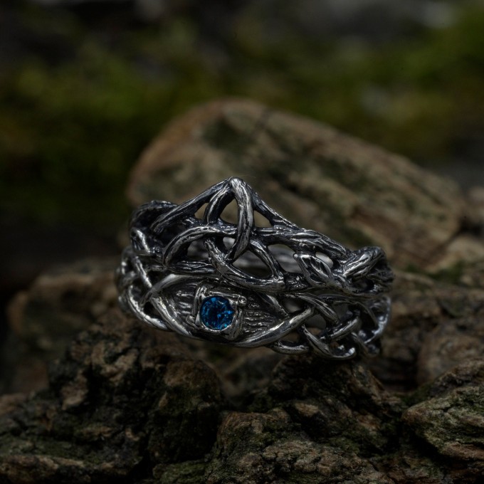Gothic Blue Topaz Ring with Intricate Celtic Knot Motif