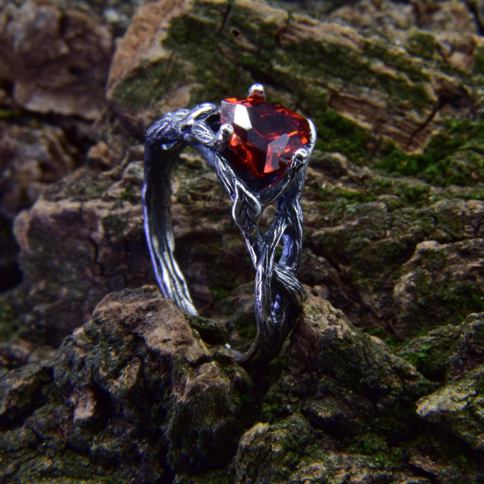 Gothic Garnet Ring with Elegant Twisting Motif