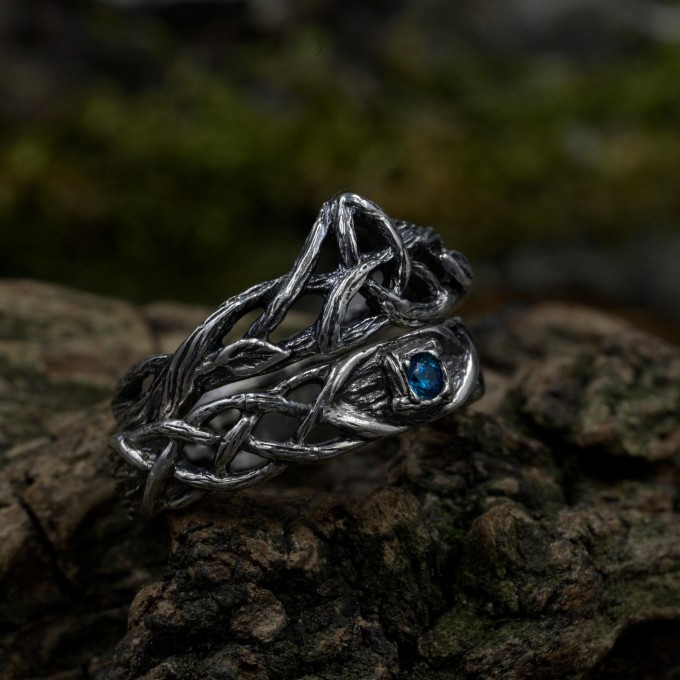 Gothic Blue Topaz Ring with Intricate Celtic Knot Motif