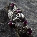 Gothic Ruby Ring with Skull Motif and Bold Design 