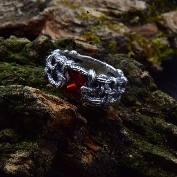 Bold Gothic Ring with Interwoven Chains and Garnet