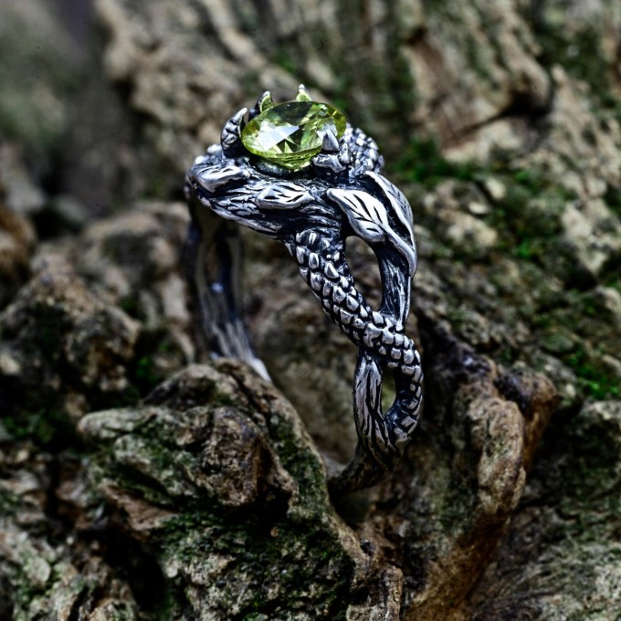 Guardian of Nature: Sterling Silver Ring with a Vibrant Olivine Gem