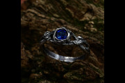 Fairy Fantasy Ring with Sapphire Twig Wedding Band and Floral Detail, Elvish Engagement Ring for Women with Braided Branch in Silver