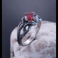 Garnet Bloom: Sterling Silver Ring with a Radiant Scarlet Gem