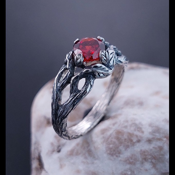 Garnet Bloom: Sterling Silver Ring with a Radiant Scarlet Gem