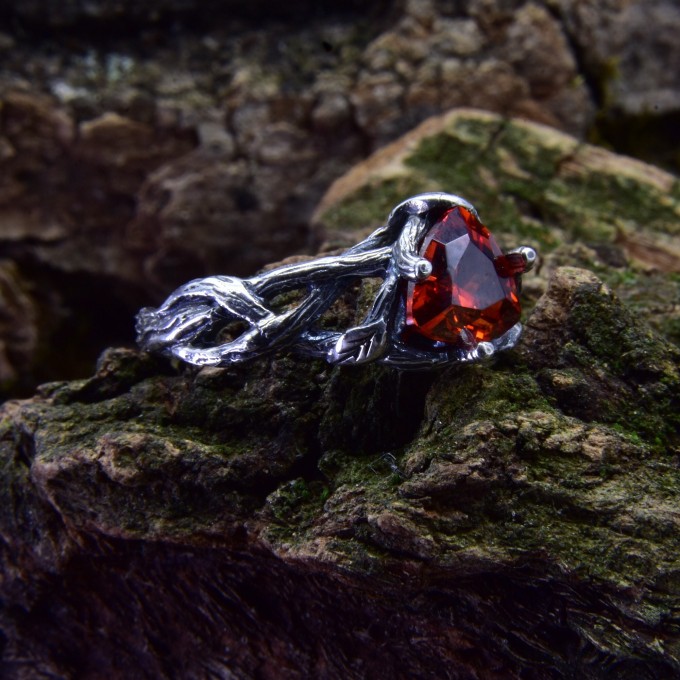 Handcrafted Silver Ring Featuring a Vibrant Red Garnet