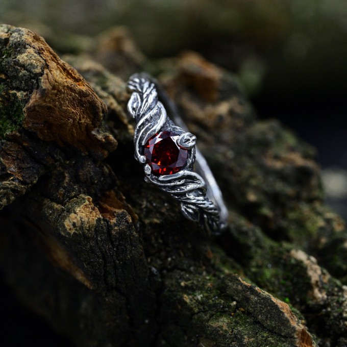 Gothic Silver Ring with Garnet and Feather Motif