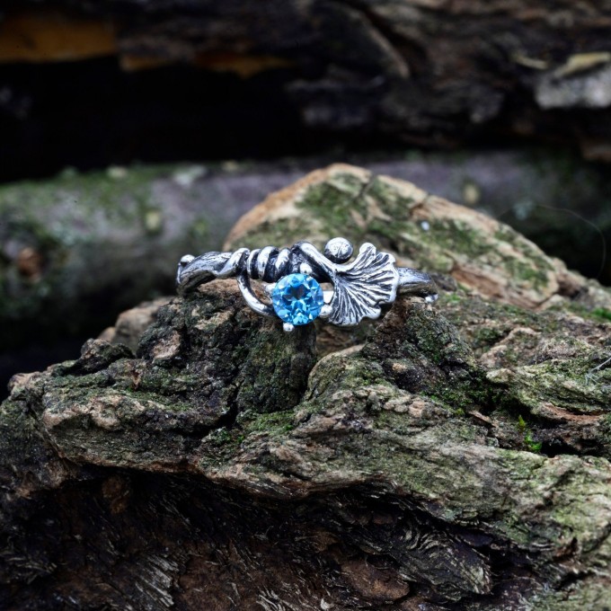 Gothic Silver Ring with a Radiant Blue Topaz