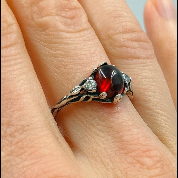 Gothic Garnet Ring with Bold Claw Design