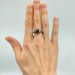 Gothic Garnet Ring with Bold Claw Design