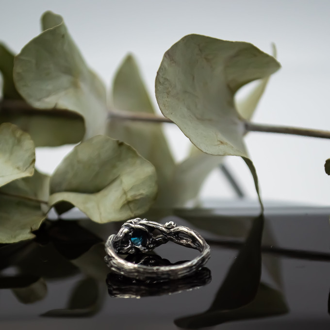 Wings of Serenity: Gothic Sterling Silver Ring with Blue Topaz