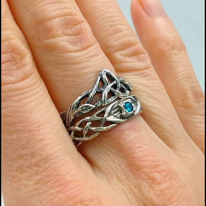 Gothic Blue Topaz Ring with Intricate Celtic Knot Motif