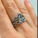 Gothic Blue Topaz Ring with Intricate Celtic Knot Motif