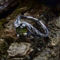 Elegant Silver Ring Featuring a Stunning Green Peridot