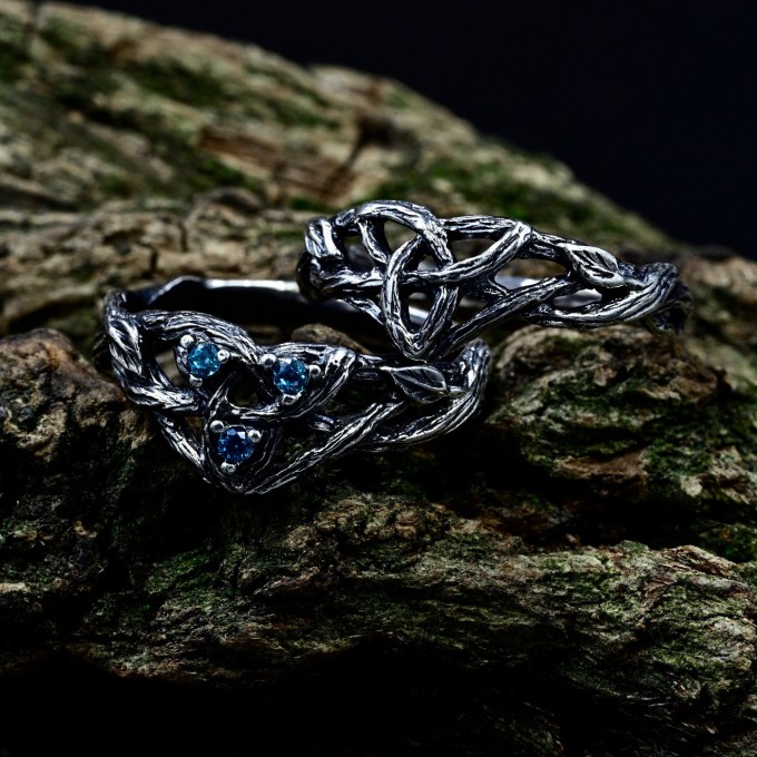 Intricate Gothic Ring with Blue Topaz Accents
