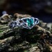 Elegant Silver Ring with Mystical Emerald Gemstone