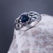 Intricate Silver Ring with Sapphire and Nature Motif