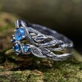 Elegant Vine Design Silver Ring Set with Blue Topaz